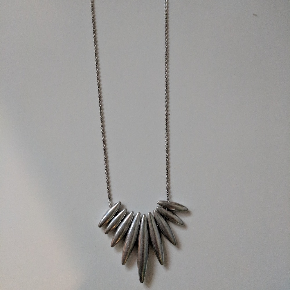 Long, silver necklace